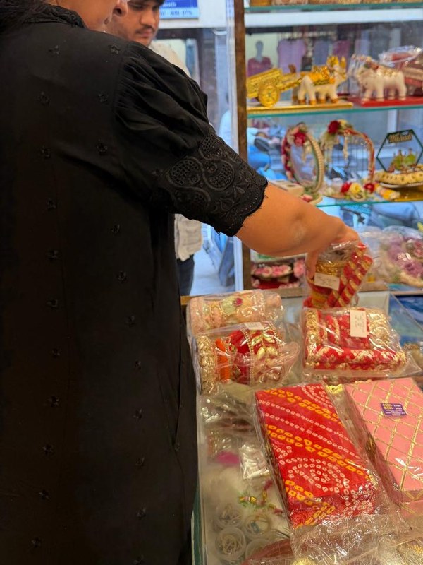Navya selecting a piece at a trusted supplier in India